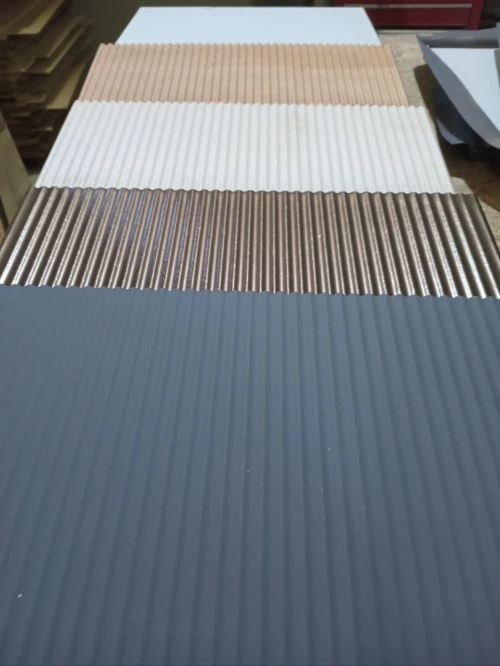 Revêtement des panneaux profilés - PRESSE A MEMBRANE