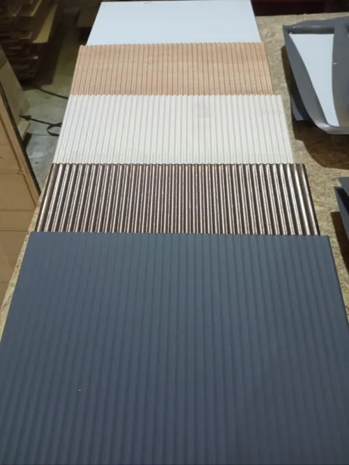Revêtement des panneaux profilés - PRESSE A MEMBRANE