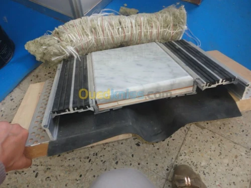 couvre joint et joint de dilatation