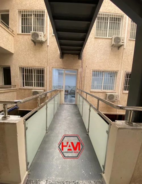 Rampe d'escalier inox en verre 