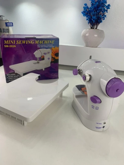 Machine à coudre portable - électrique avec table de travail