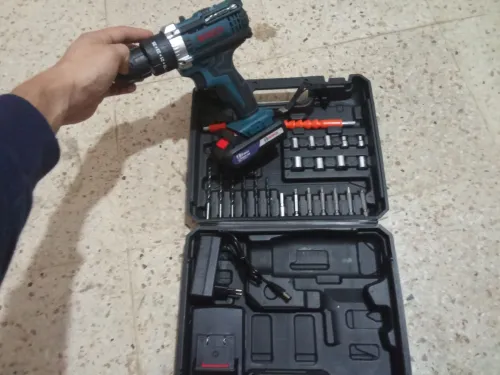   Perceuse BOSCH 13 MM +Perceuse HILTI BOSCH M+ Tronceneuse BOSCH 115 2CH+ Marteau Piquer BOSCH 38