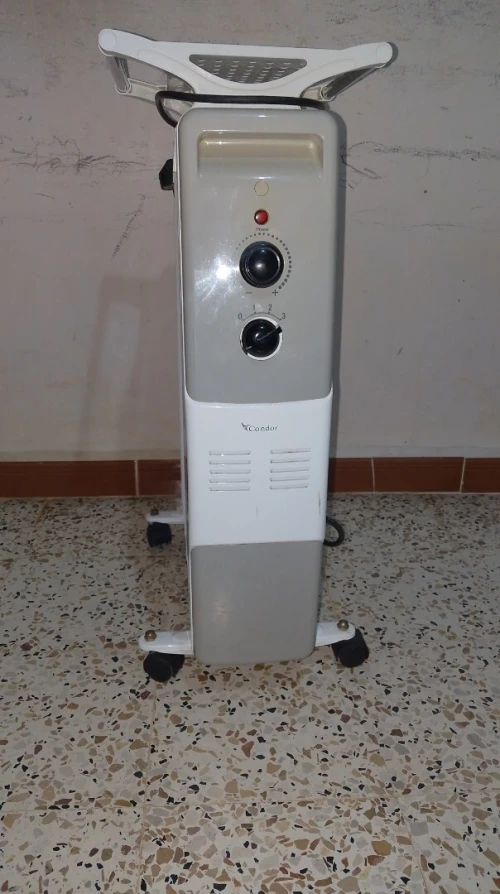مدفأة كهربائية بالزيت  RADIATEUR ELECTRIQUE À BAIN D'HUILE