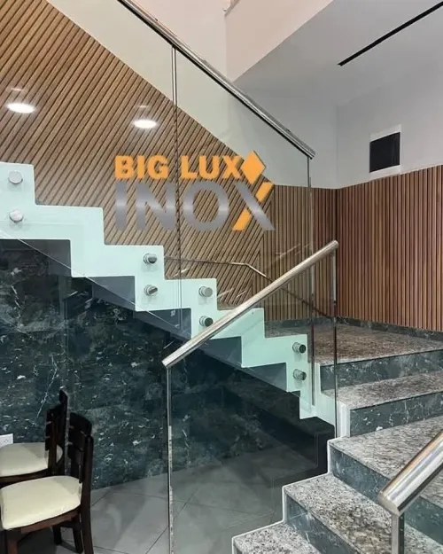 Travaux en inox et verre