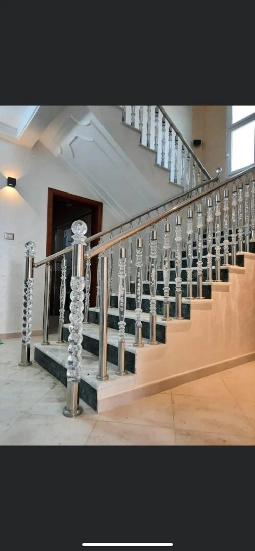 Travaux en inox et verre