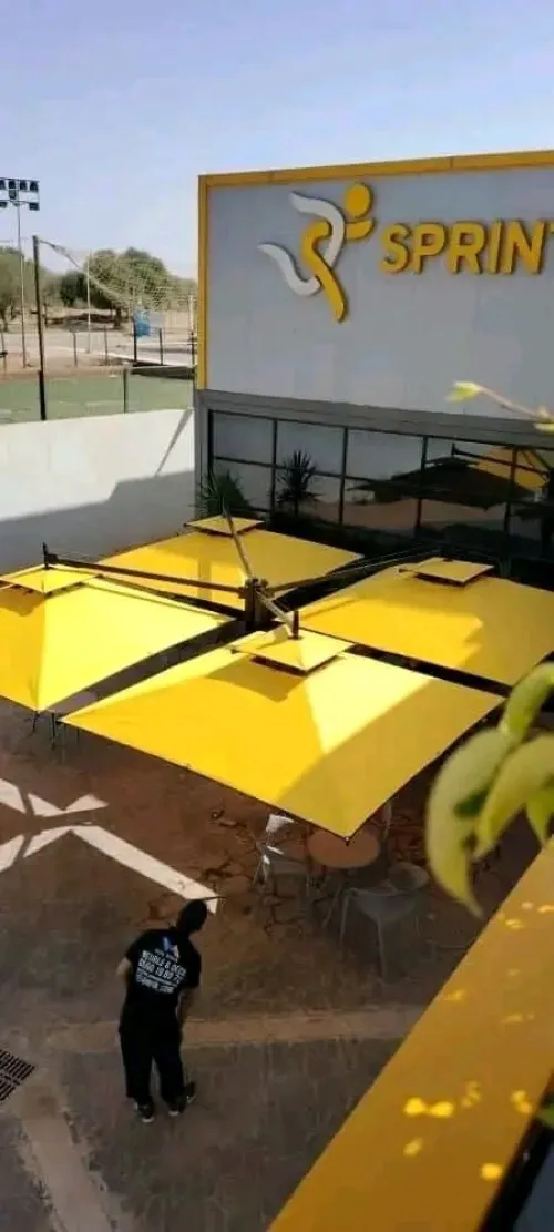 parasol t4 ( 6 m sur 6 m) fixtation sur le sol