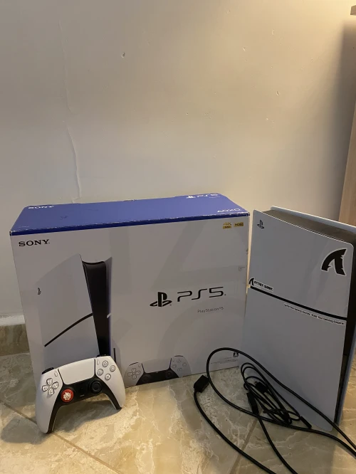 Ps5 slim 1to 1mannete avec ticket de garantie