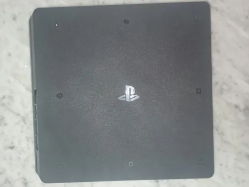 PS4 SLIM 1TB مفلاشي اصدار 12.02 بدون قرص +20 لعبة+فلاش ديسك 128GB