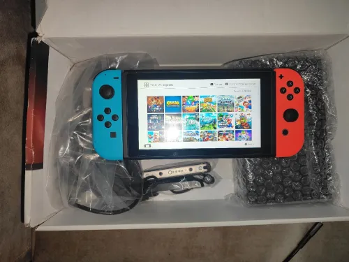 Nintendo switch V1 2018 flashée puce 128 go excellent état