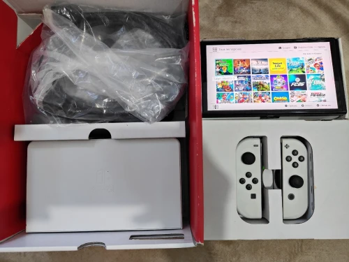 Nintendo switch oled flashée 128 go en excellent état