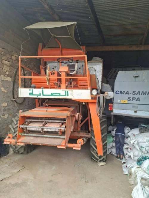 A VENDRE:  MOISSONEUSE  ( saba neuve   ) , TRACTEUR somica sur cale   , REMORQUE A BENNE