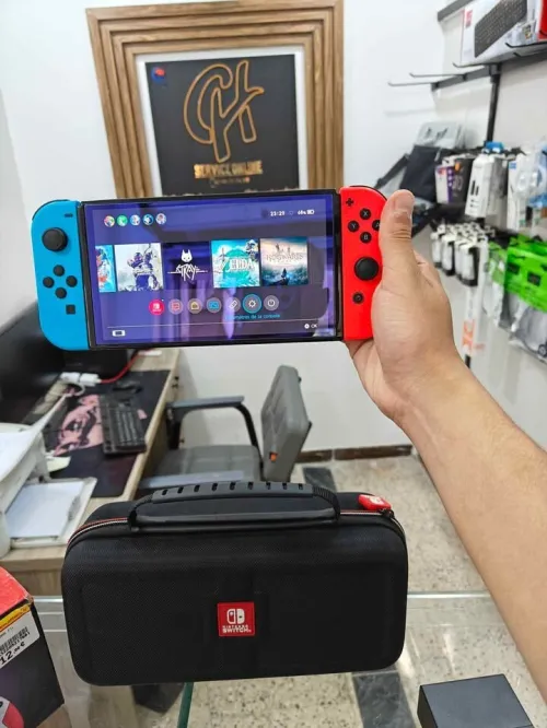 Nintendo Switch OLED tout neuf flaché 128g Plain de jeux avec toute les accessoires 