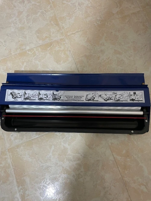 Machine à coller papier peint