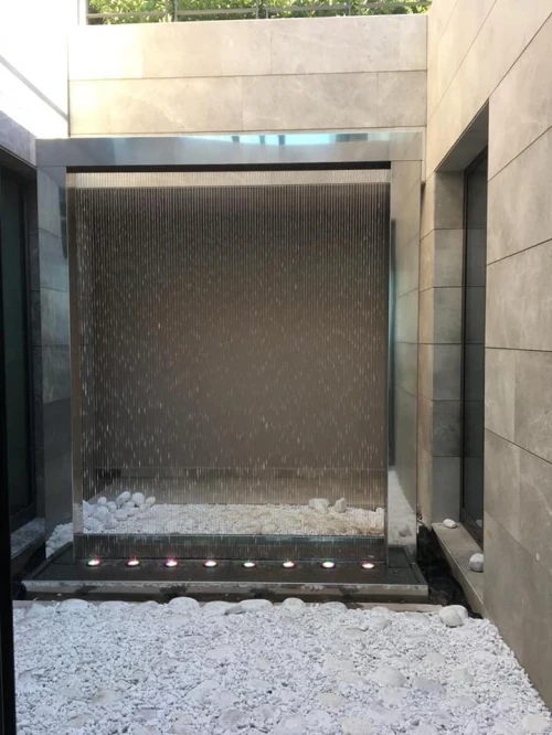 réalisation de fontaine, mur d'eau et mur a bulle. شلال sur mesure