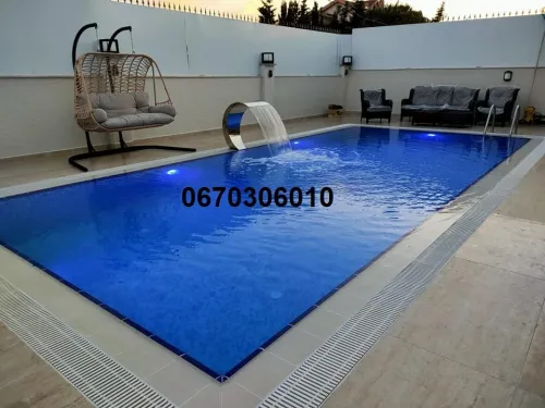  réalisation de piscine naturelle et miroir  تصميم وإنشاء حمامات السباحة