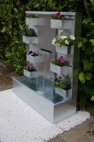 réalisation de fontaine, mur d'eau et mur a bulle. شلال sur mesure
