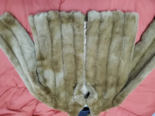 Veste en fourrure et bottes véritable cuir