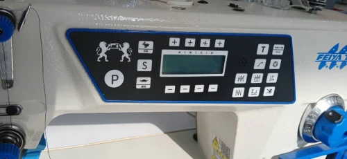 ماكينة  الخياطة مع كومبيوتر -machine a coudre droite avec ecran
