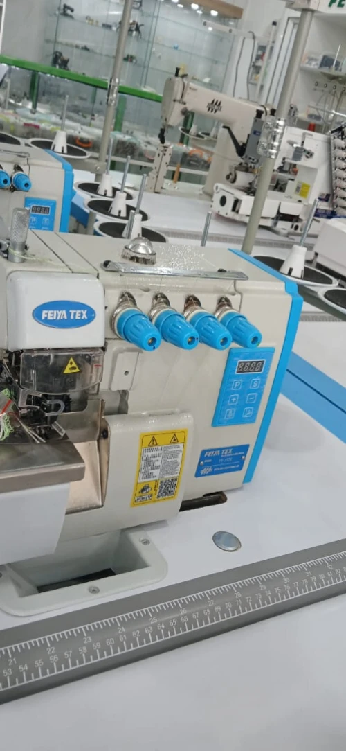 ماكينة الخياطة سورجي 5 خيوط machine à surjeteuse5 fill silencieuse feiya tex 