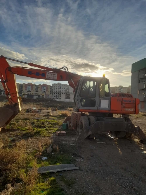 Fiat hitachi Pelle 1999