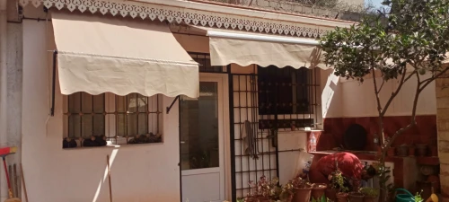 Tinda et bâche pour locaux et maison 