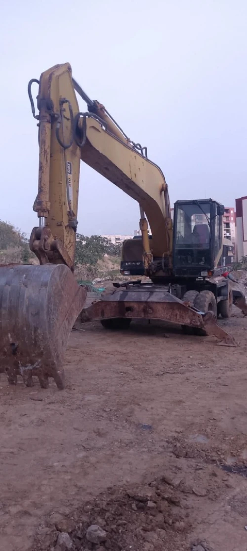 Hyundai Caterpillar M320 pneumatique 