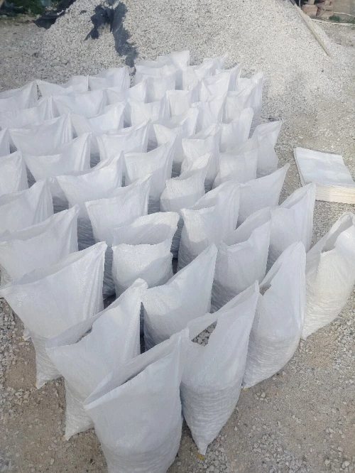 Gravier décoration للتزيين Gravier de marbre . Sac blanc حصى رخامي للحدائق والمنازل،