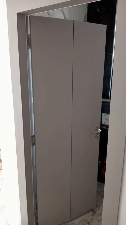 Unité de production de porte intérieure