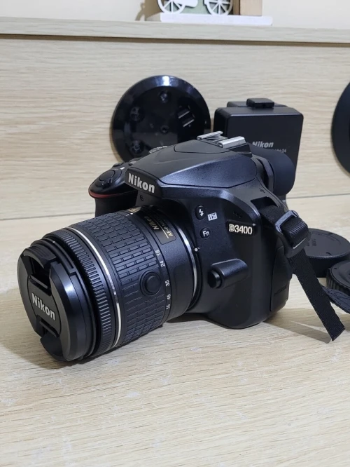 Nikon D3400 Appareil Photo Numérique Réflex 24.2 Mpix + OBJECTIF Nikon AF-P DX Nikkor 18 55mm f 3.5 5.6 g vr