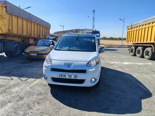 Peugeot Partener tepee 2012 Rakor sghir fel bab mor chofeur+ 30 cm rakor fel mala foga