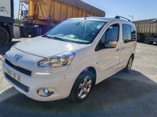 Peugeot Partener tepee 2012 Rakor sghir fel bab mor chofeur+ 30 cm rakor fel mala foga