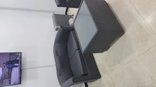 Fauteuil chauffante avec table