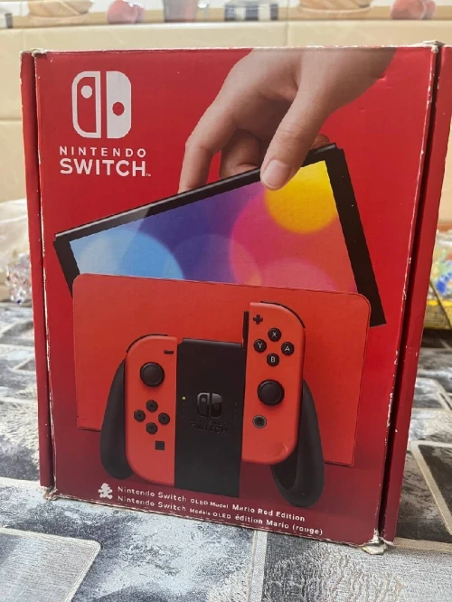 Nintendo switch OLED édition mario red excellent état