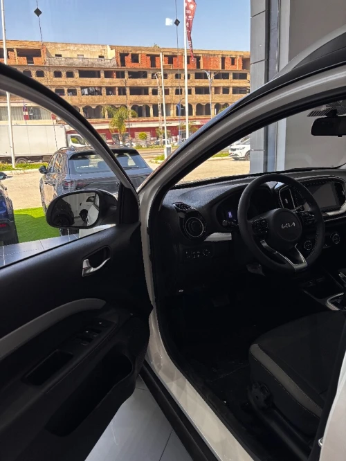 Kia KX1 2026 BLANCHE AVEC TOIT NOIR