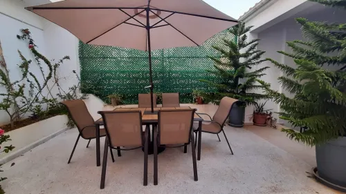Table de jardin carrelée + 6 chaises