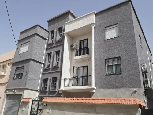 Facade monocouche تهيئة و طلاء الواجهات الخارجية 