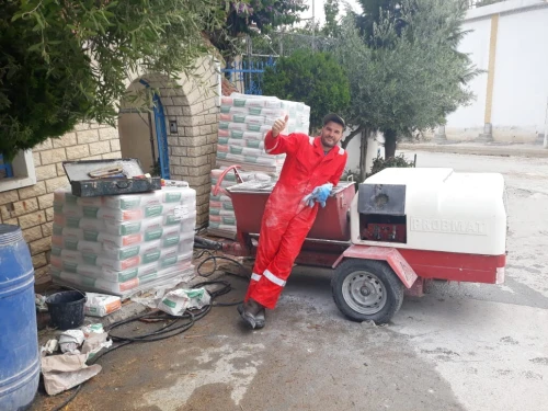 Facade monocouche تهيئة و طلاء الواجهات الخارجية 