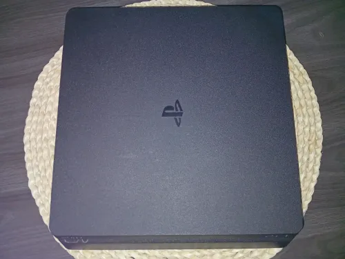 PS4 SLIM + 2 JEUX(Fifa22,23) Version 13.5