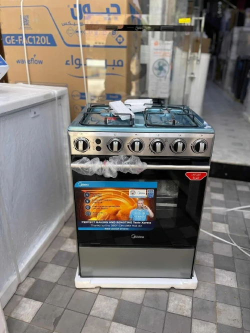 Cuisinière midea  4 feux inox ventilé