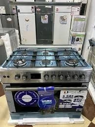 Promotion cuisinière ARTHUR MARTIN 6 feux gaz electrique double ventilateur