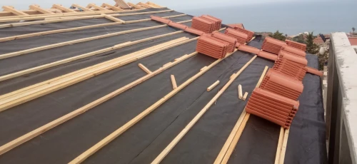 Travaux de tuile et charpente