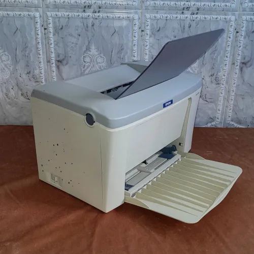 2 Imprimants Epson en panne, pour pièces ou réparation - (Stylus DX3800 + EPL-6100L)
