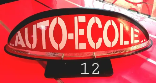 Panneau de toit auto-école