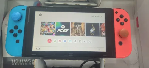 Nintendo Switch flashé avec 2 boots on ligne et off ligne + carte memoire 128go+ manette