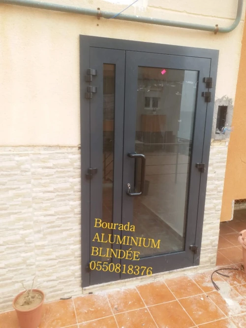 Porte blinde aluminium Série 75000 avec lecteur cib 