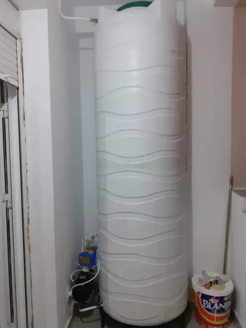 installation citerne à eau, machine à laver 
