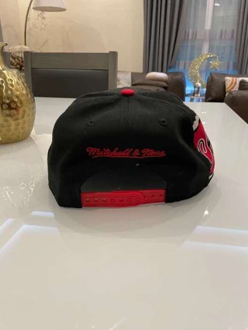 Casquette snapback noire/ rouge Mitchell & Ness Chicago Bulls Jumbotron, Origine