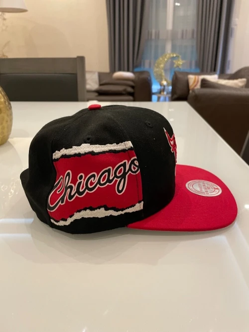 Casquette snapback noire/ rouge Mitchell & Ness Chicago Bulls Jumbotron, Origine