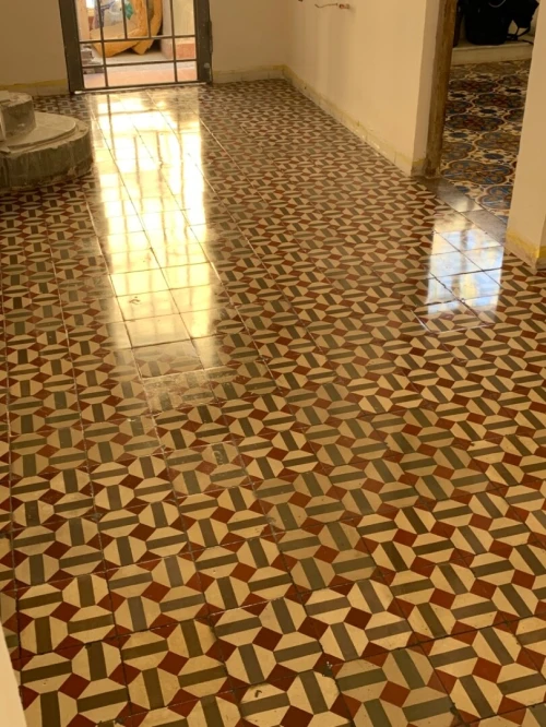 Poncage carrelage ciment 