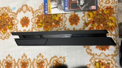 PS4 Slim ÉTAT NEUF JAMAIS OUVERTE IMPORTÉE FRANCE + PACK JEUX